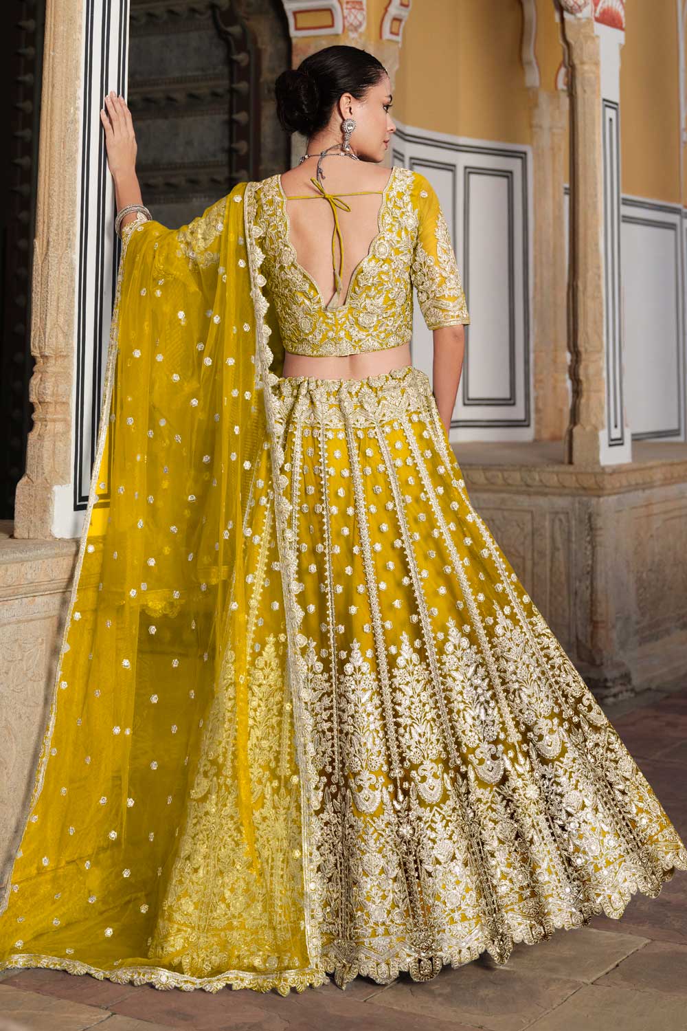 Radiant Net Fabric Yellow Color Embroidered Lehenga