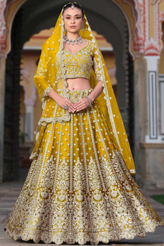 Radiant Net Fabric Yellow Color Embroidered Lehenga