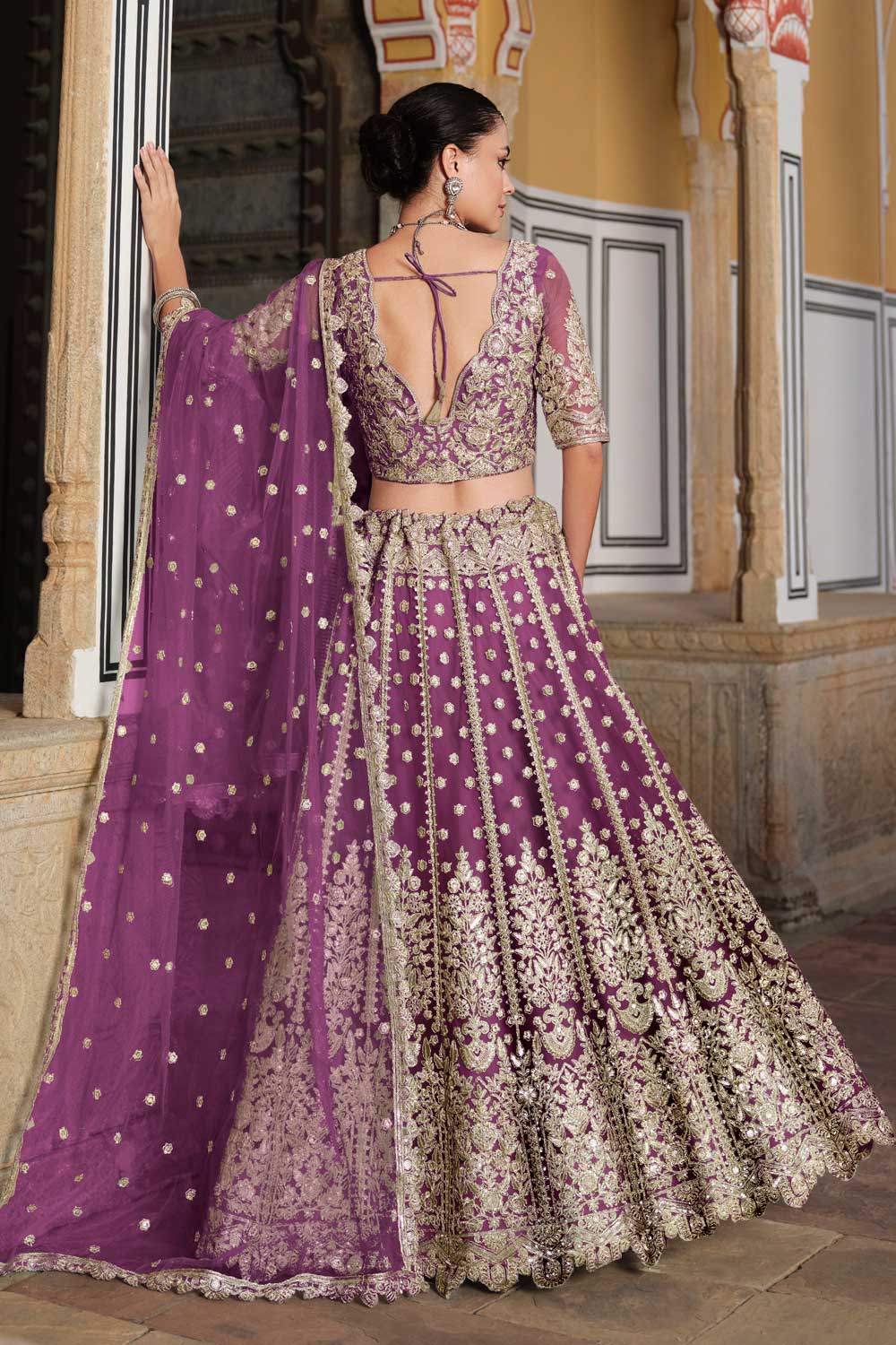 Lavender Color Alluring Embroidered Lehenga Choli In Net Fabric