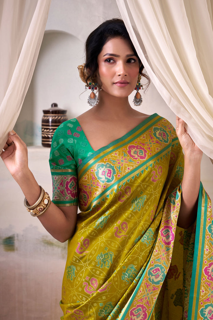 Fabulous Festive Look Mehendi Green Color Patola Printed Silk Saree