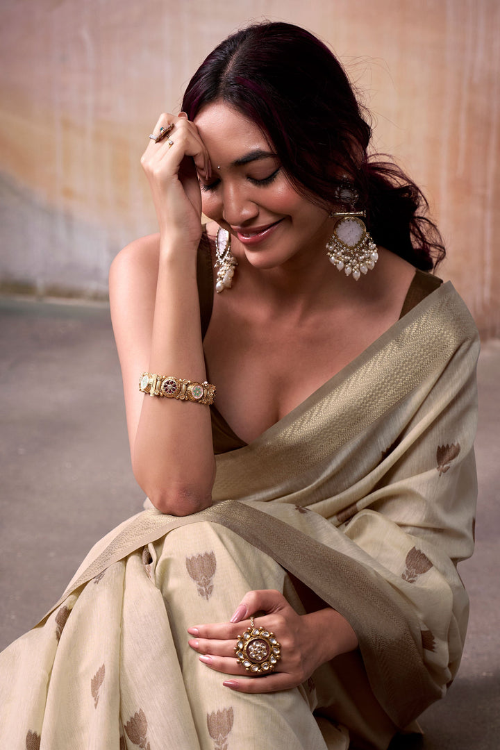 Tempting Beige Color Cotton Silk Saree With Weaving Work