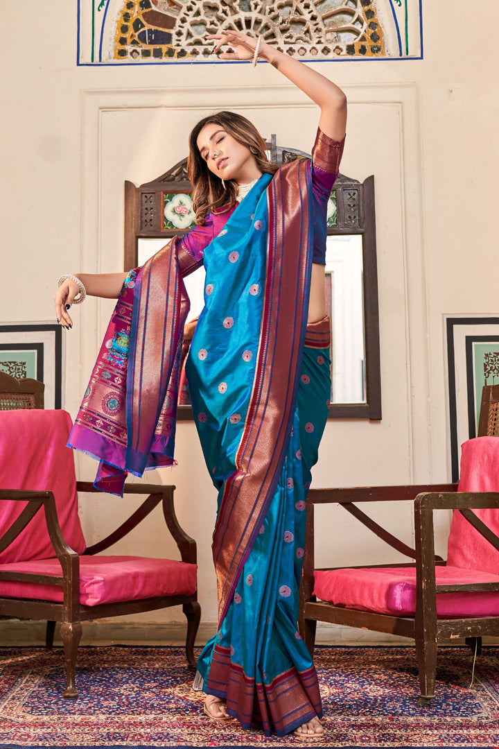 Ingenious Weaving Designs Cyan Color Paithani Silk Saree
