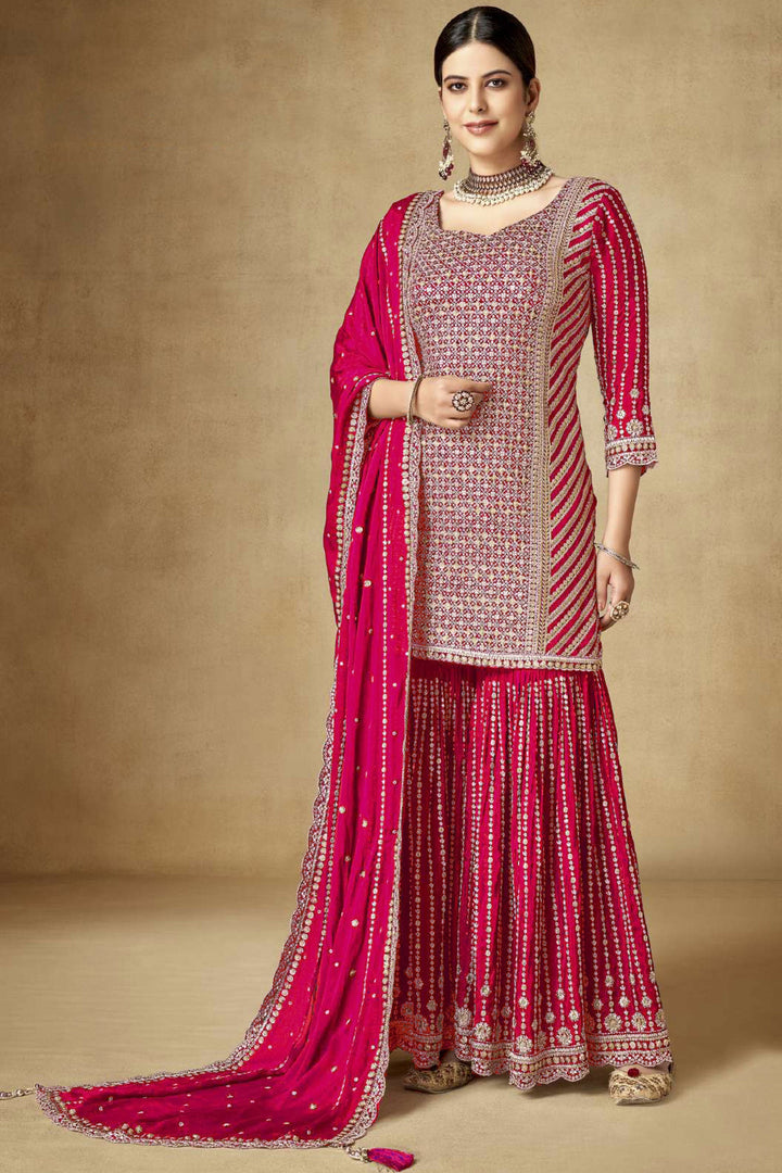 Traditional Embroidered Rani Color Palazzo Suit In Chinon Fabric