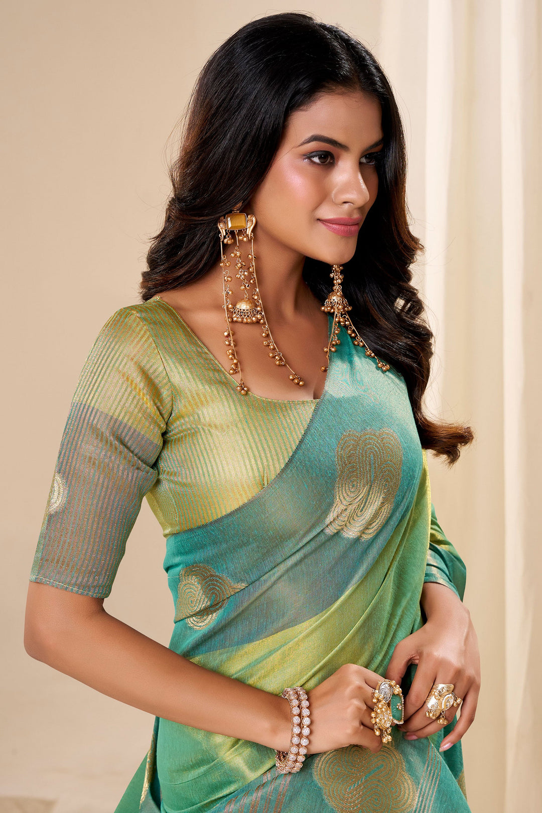 Weaving Work On Captivating Tissue Silk Fabric Sea Green Saree