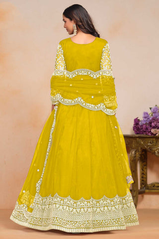 Tempting Net Fabric Yellow Color Embroidered Anarkali Suit