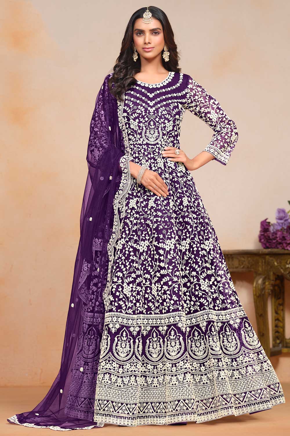 Engaging Purple Color Net Fabric Embroidered Anarkali Suit