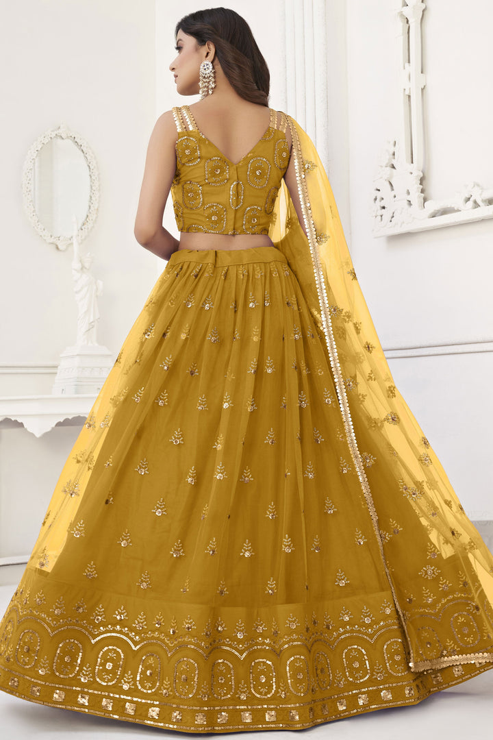 Mustard Color Net Fabric Sequins Embroidered Lovely Lehenga