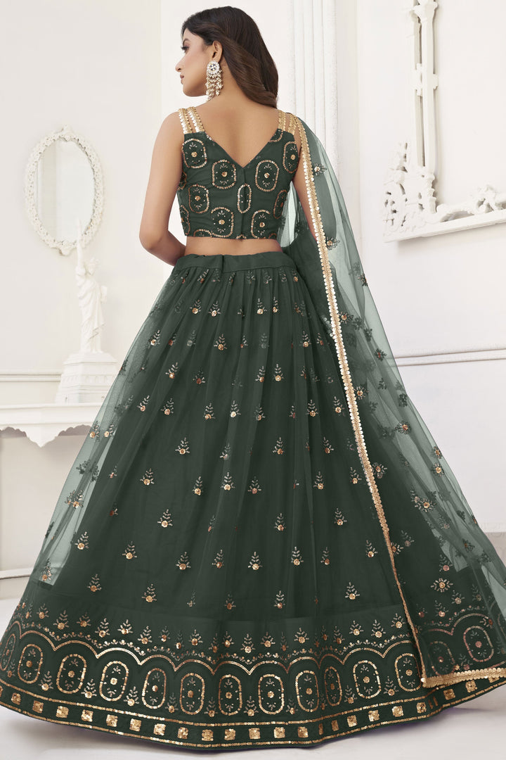 Sequins Embroidered Dark Green Color Net Fabric Trendy Lehenga For Sangeet Function
