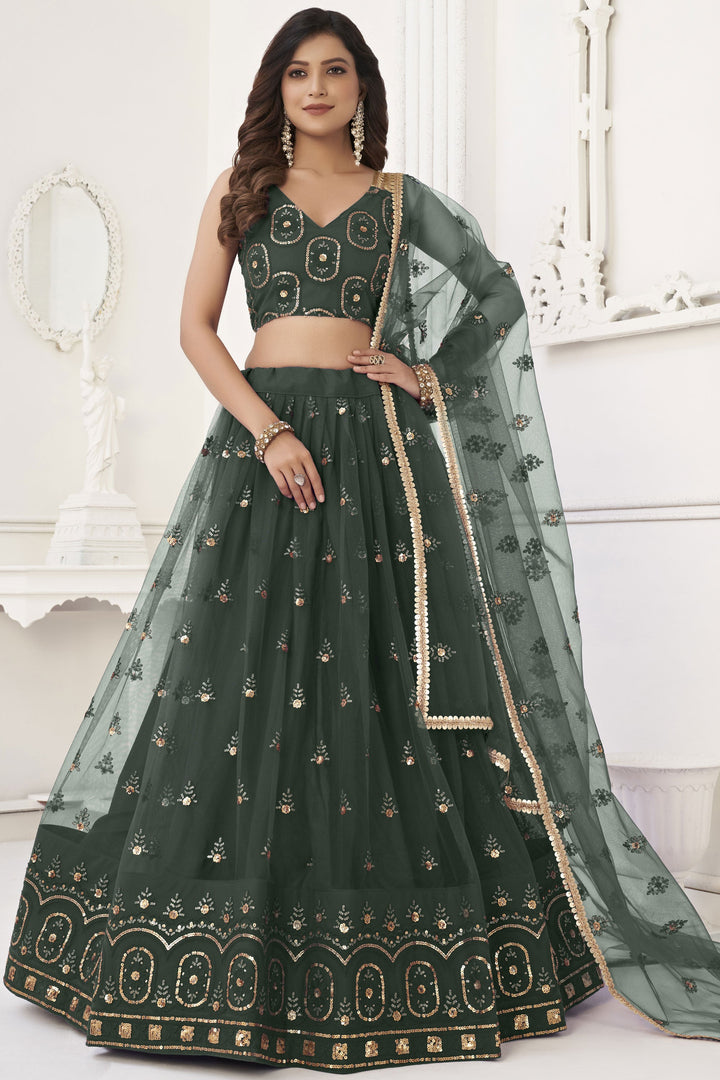 Sequins Embroidered Dark Green Color Net Fabric Trendy Lehenga For Sangeet Function