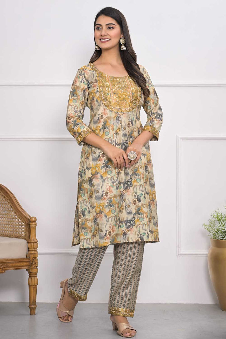 Beguiling Cream Color Chanderi Fabric Kurti With Bottom