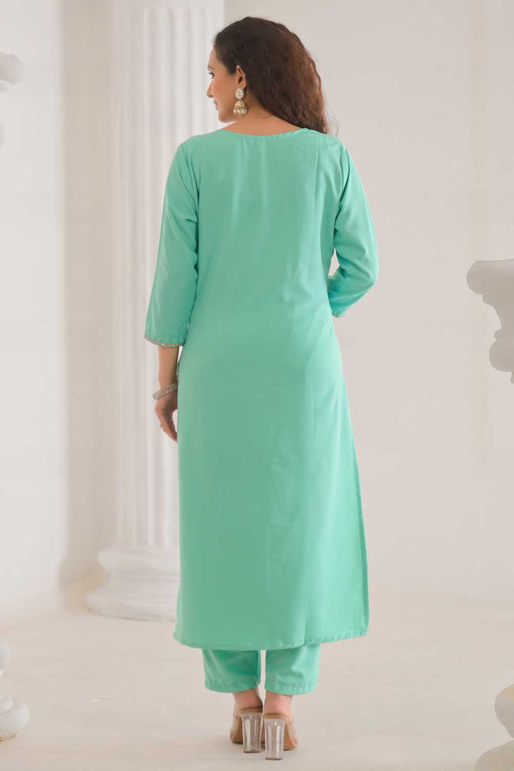 Engaging Sea Green Color Rayon Fabric Readymade Salwar Suit
