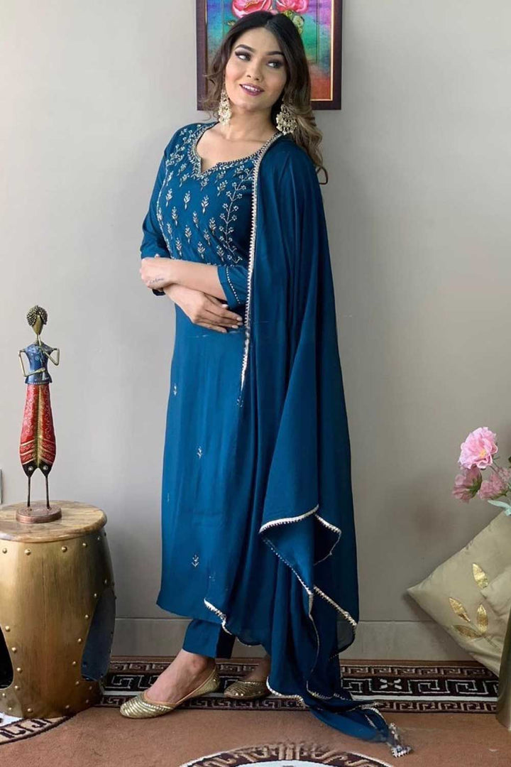 Graceful Rayon Fabric Teal Color Readymade Salwar Suit