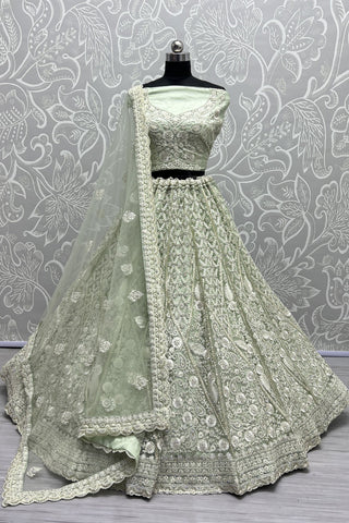 Sangeet Wear Wear Sea Green Color Glorious Lehenga In Net Fabric