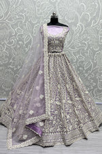 Load image into Gallery viewer, Lavender Color Sangeet Wear Wear Captivating Lehenga In Net Fabric
