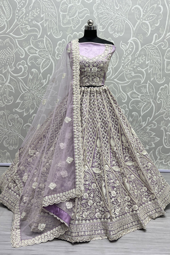 Lavender Color Sangeet Wear Wear Captivating Lehenga In Net Fabric