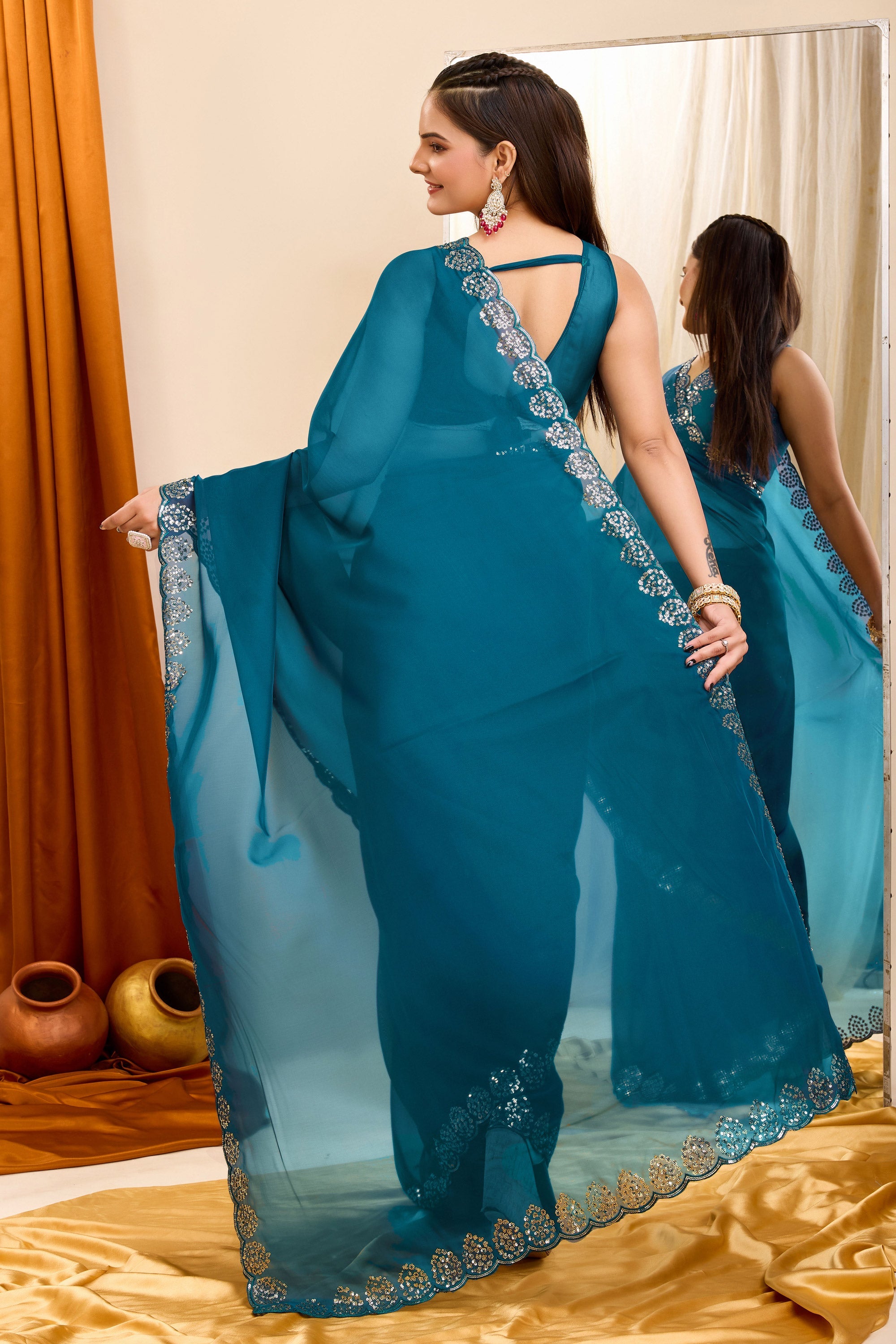 Sequins Work Attractive Casual Wear Georgette Saree In Teal Color