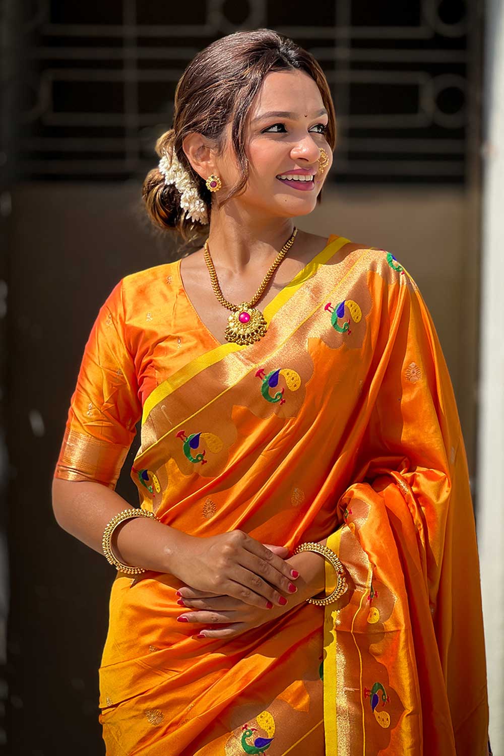 Weaving Work Soothing Paithani Silk Saree In Orange Color