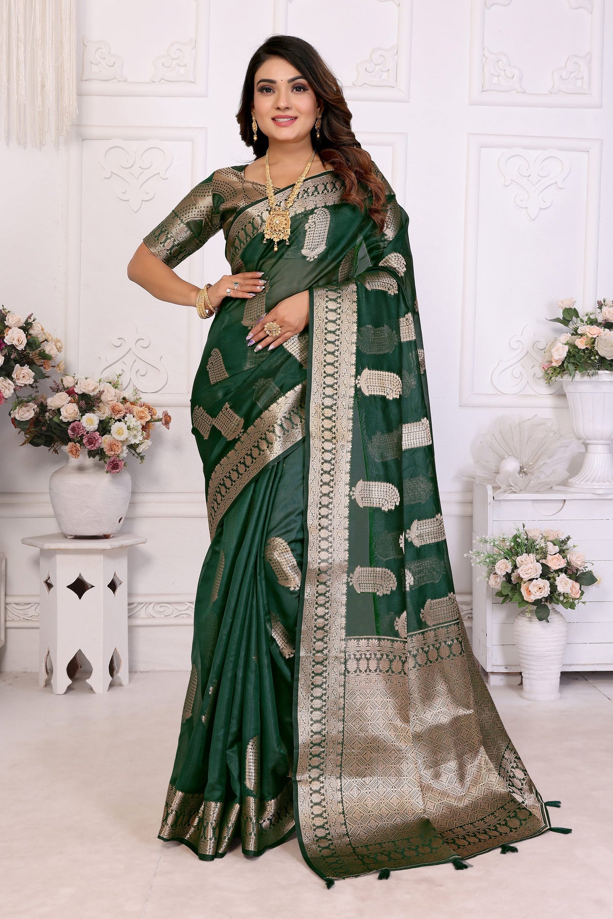 Function Wear Organza Zari Weaving Saree In Dark Green Color