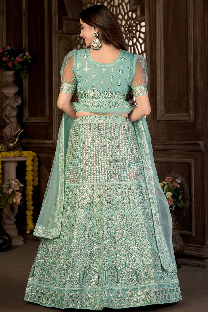 Sea Green Color Net Fabric Awesome Lehenga With Sequins Work