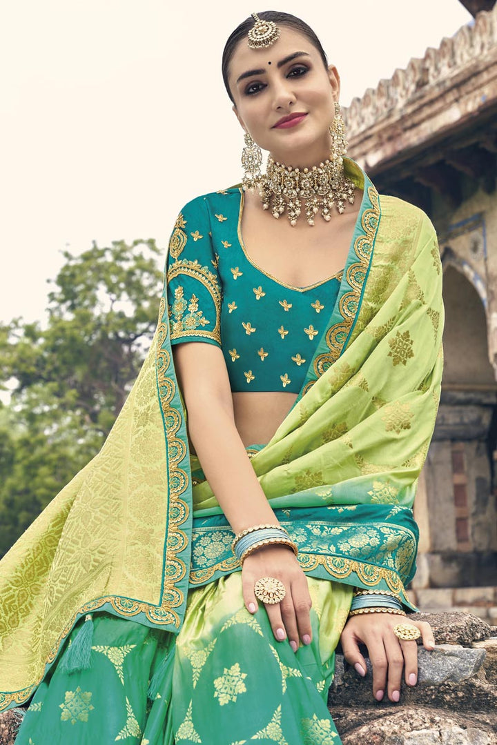 Weaving Work Sea Green Color Silk Fabric Reception Wear Saree