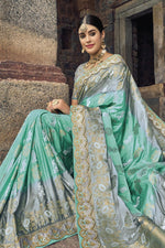 Load image into Gallery viewer, Cyan Color Weaving Work Silk Fabric Party Wear Saree
