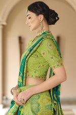 Load image into Gallery viewer, Teal Color Soothing Function Wear Weaving Work Silk Saree
