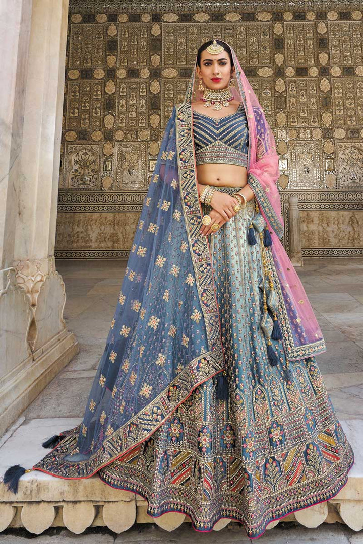 Silk Fabric Multi Color Embroidered Work Fantastic Bridal Lehenga With Double Dupatta
