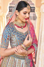 Load image into Gallery viewer, Silk Fabric Embroidered Work Bewitching Cyan Color Bridal Lehenga
