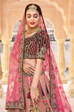 Load image into Gallery viewer, Silk Fabric Embroidered Work Imposing Bridal Lehenga In Pink Color
