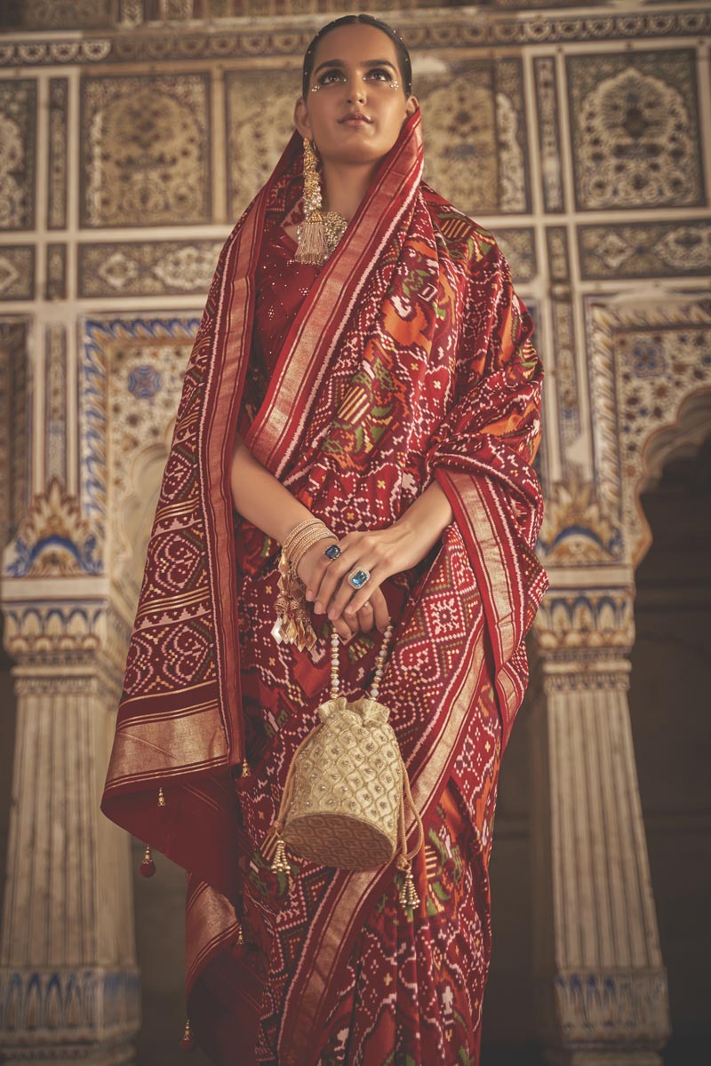 Art Silk Fabric Vivacious Patola Printed Saree In Maroon Color