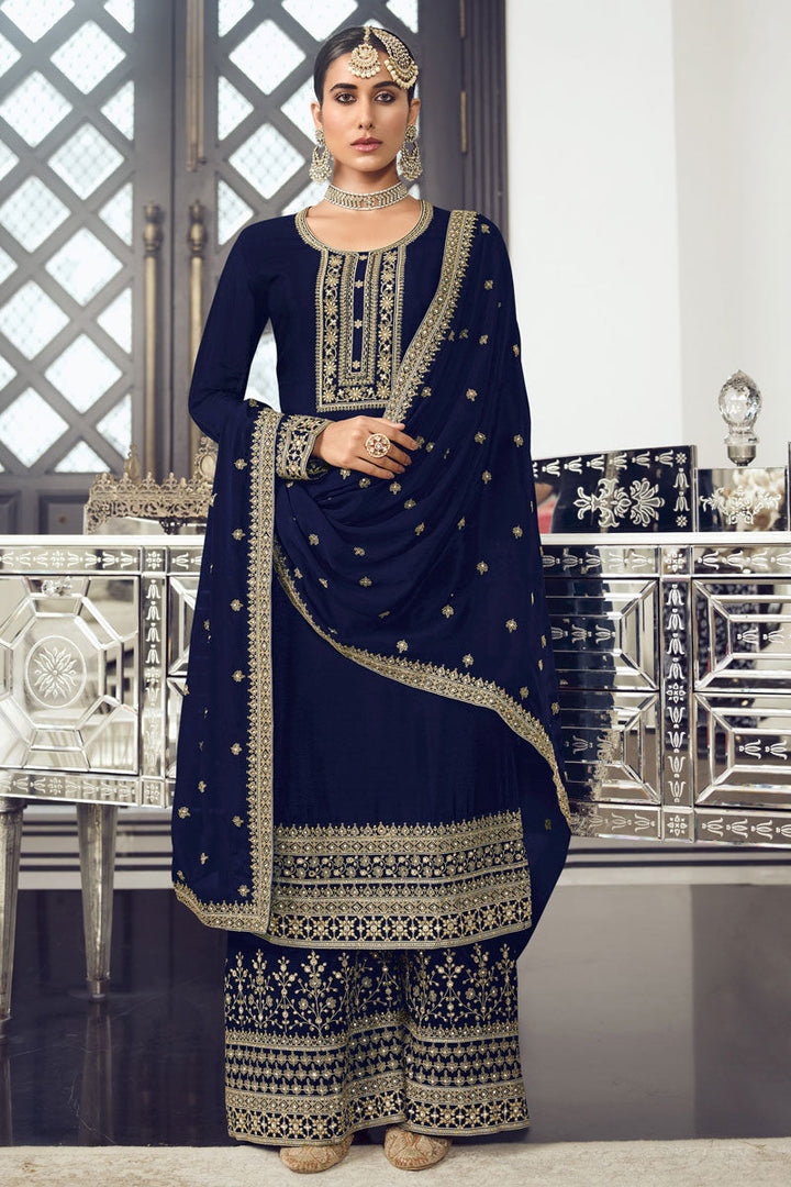 Fabulous Art Silk Fabric Palazzo Suit In Navy Blue Color With Embroidered Work