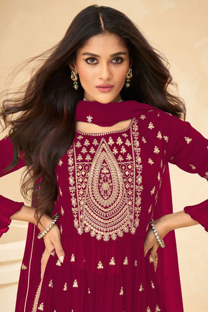 Exquisite Georgette Fabric Embroidered Palazzo Suit In Rani Color
