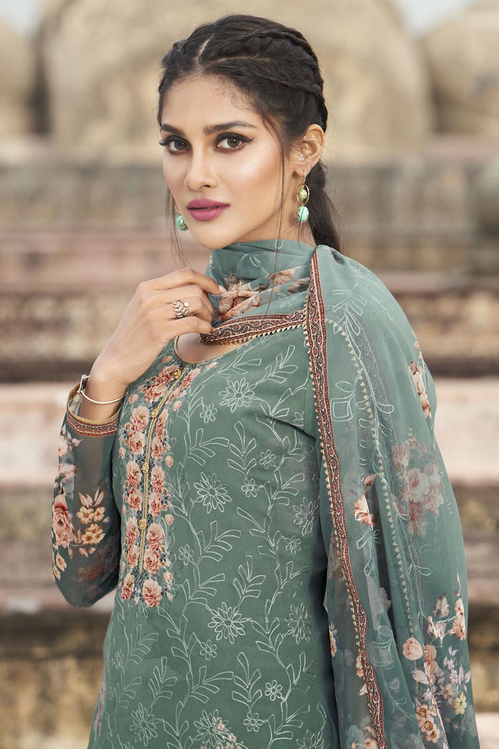 Georgette Fabric Festive Wear Elegant Embroidered Straight Cut Suit In Teal Color