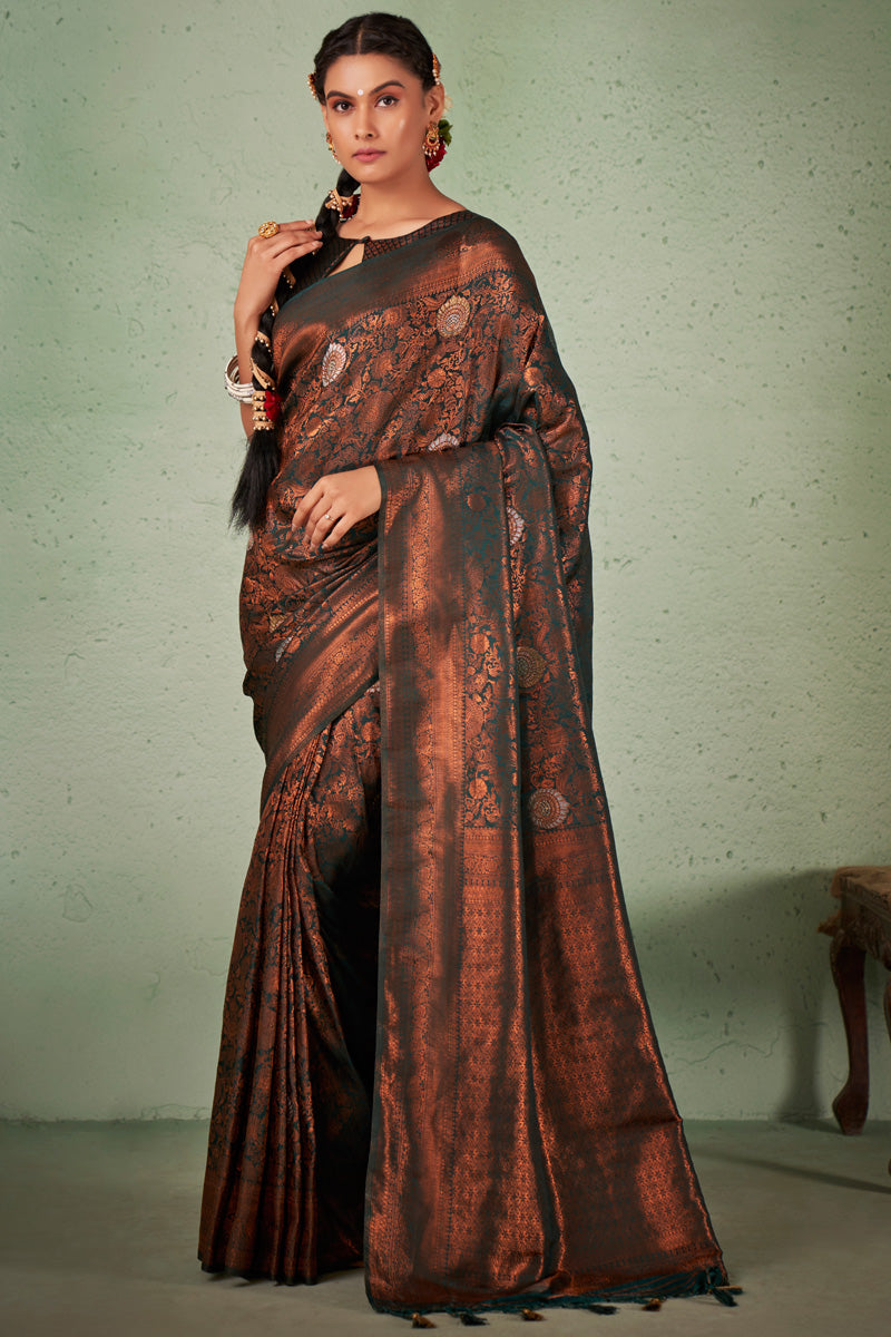 Teal Color Georgette Fabric Ravishing Weaving Work Saree