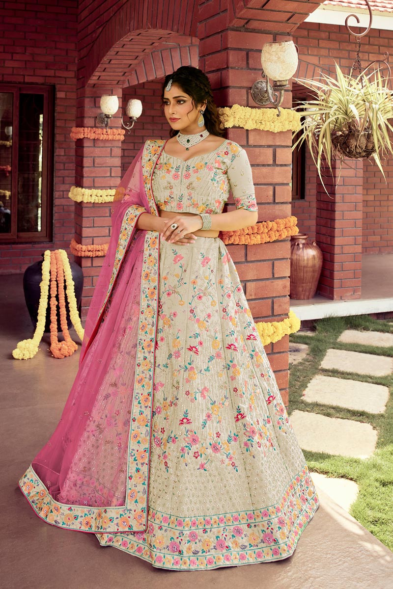 Radiant Embroidered Work Beige Color Art Silk Fabric Wedding Wear Bridal Lehenga