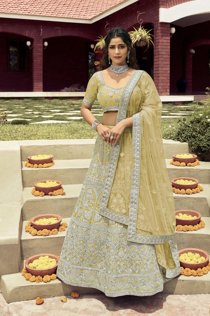 Alluring Art Silk Fabric Yellow Color Wedding Wear Bridal Lehenga With Embroidered Work