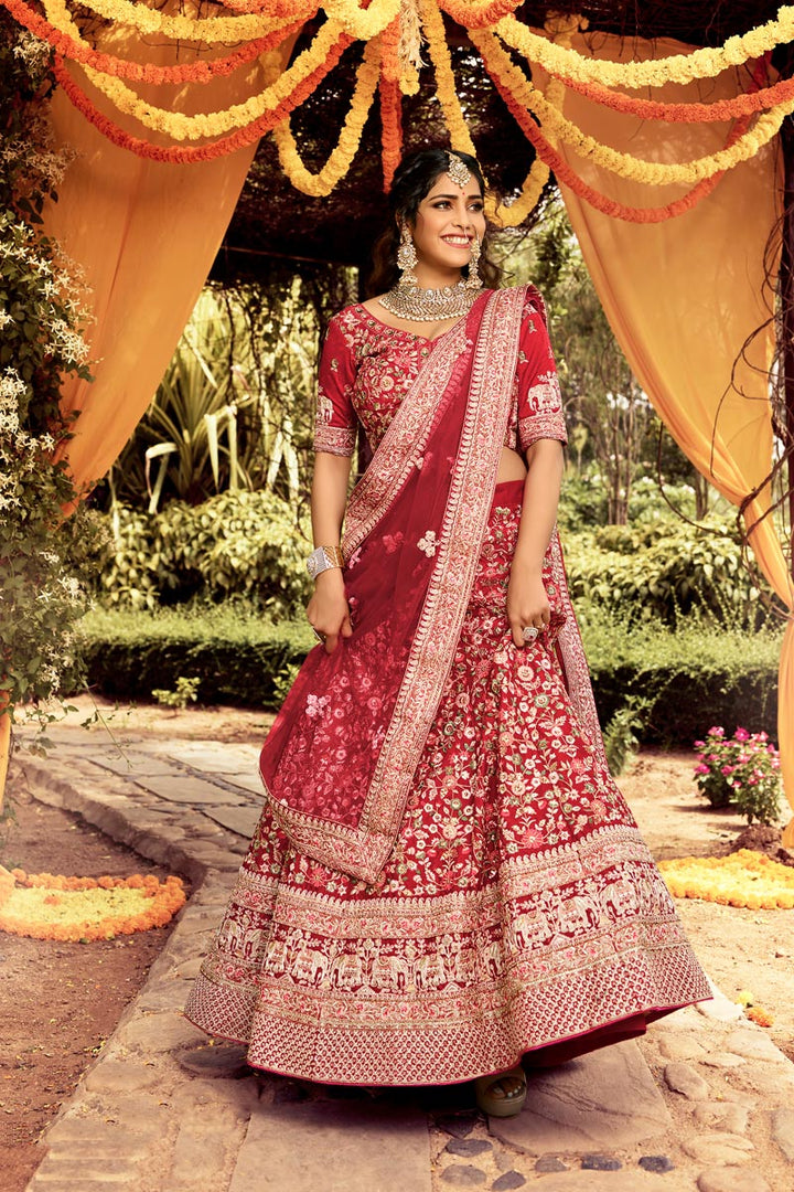 Dazzling Red Color Art Silk Fabric Designer Bridal Lehenga With Embroidered Work