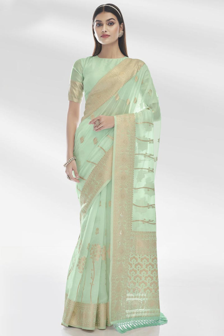 Attractive Organza Fabric Sea Green Color Saree With Weaving Work