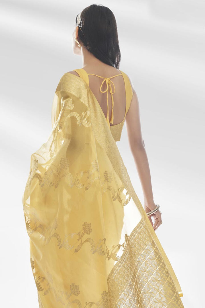 Trendy Organza Fabric Yellow Color Saree With Weaving Work