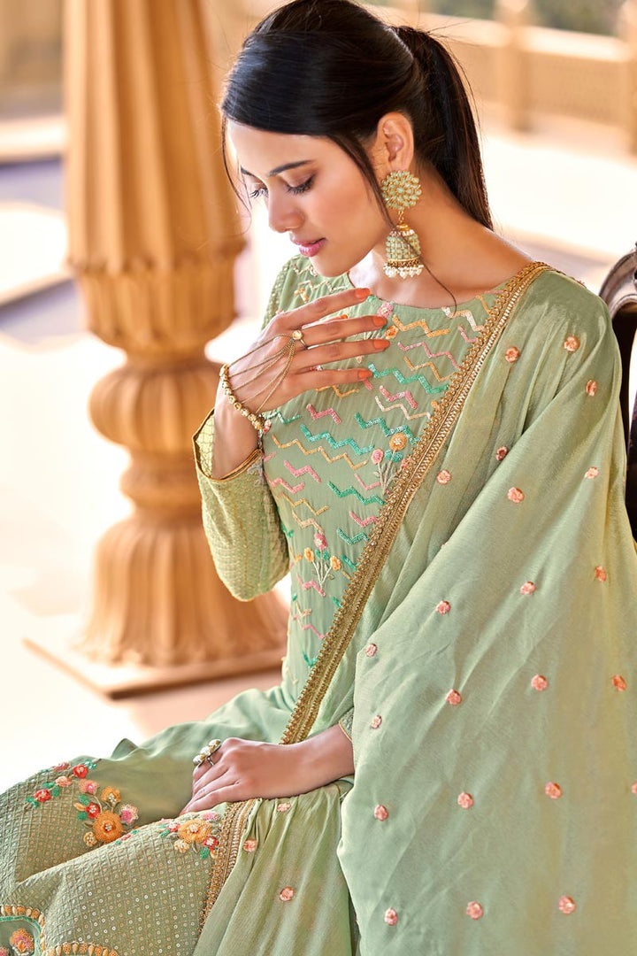 Bright Sea Green Color Viscose Fabric Salwar Kameez In Embroidered Work
