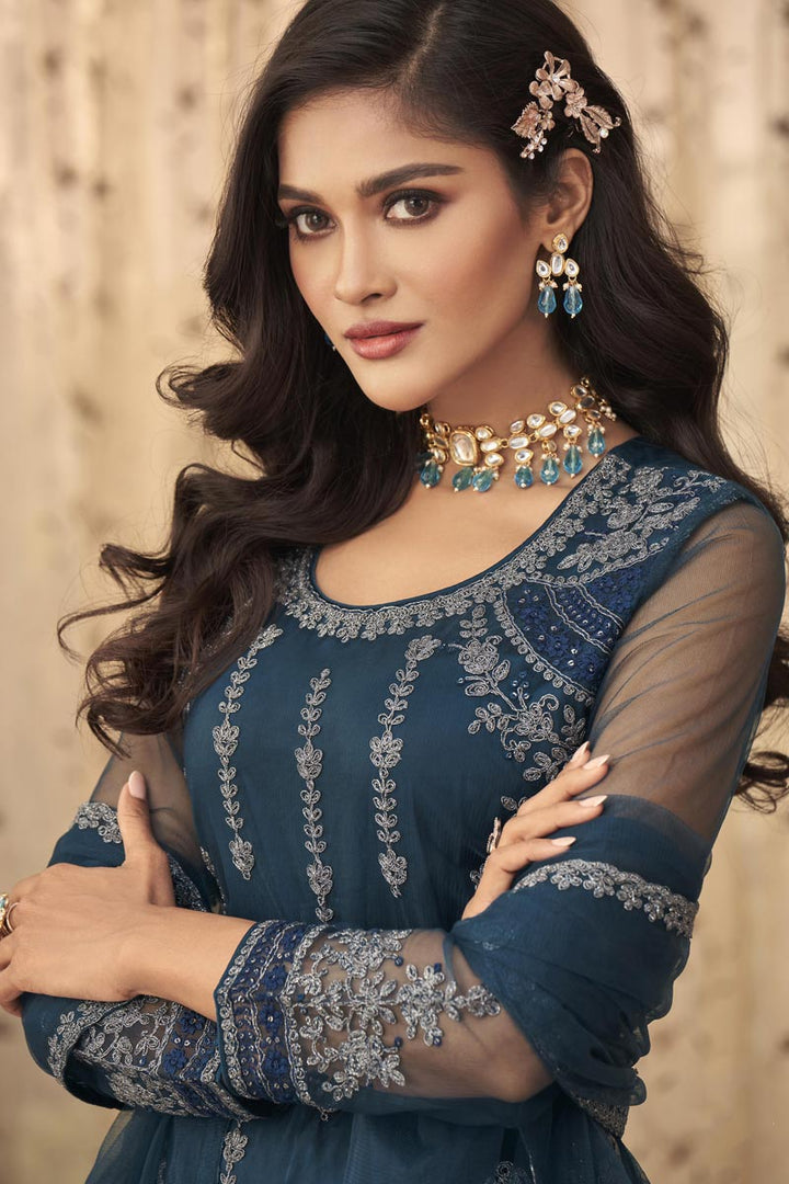 Soothing Net Fabric Embroidered Party Wear Salwar Suit In Teal Color