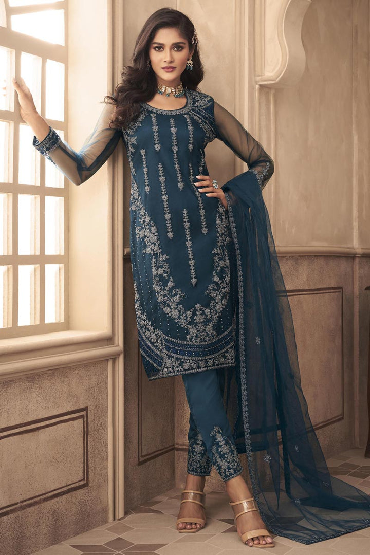 Soothing Net Fabric Embroidered Party Wear Salwar Suit In Teal Color