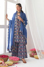 Load image into Gallery viewer, Alluring Muslin Fabric Blue Color Printed Sharara Suit
