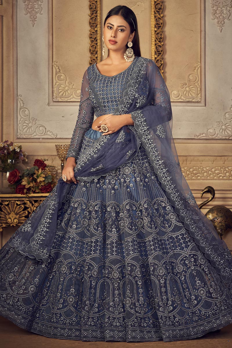 Blue Color Wedding Wear Attractive EmbroideBlue Lehenga Choli In Net Fabric