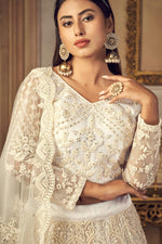 Load image into Gallery viewer, Lovely White Color Net Fabric Sangeet Wear EmbroideWhite Lehenga Choli
