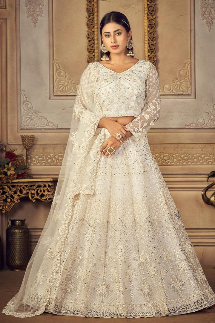 Lovely White Color Net Fabric Sangeet Wear EmbroideWhite Lehenga Choli
