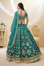 Load image into Gallery viewer, Art Silk Fabric Embroidered Sangeet Wear Designer Lehenga Choli In Teal Color
