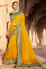 Load image into Gallery viewer, Yellow Color Sangeet Wear Art Silk Fabric Fancy Border Work Saree

