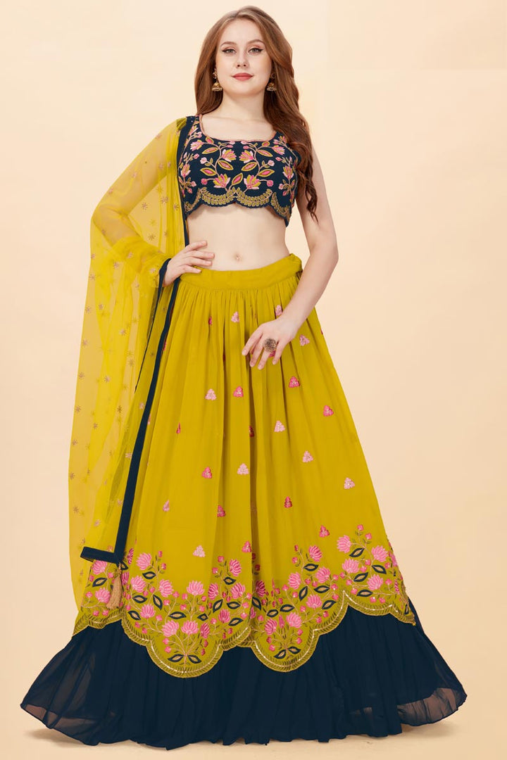 Tempting Georgette Fabric Mustard Color Lehenga With Embroidered Work