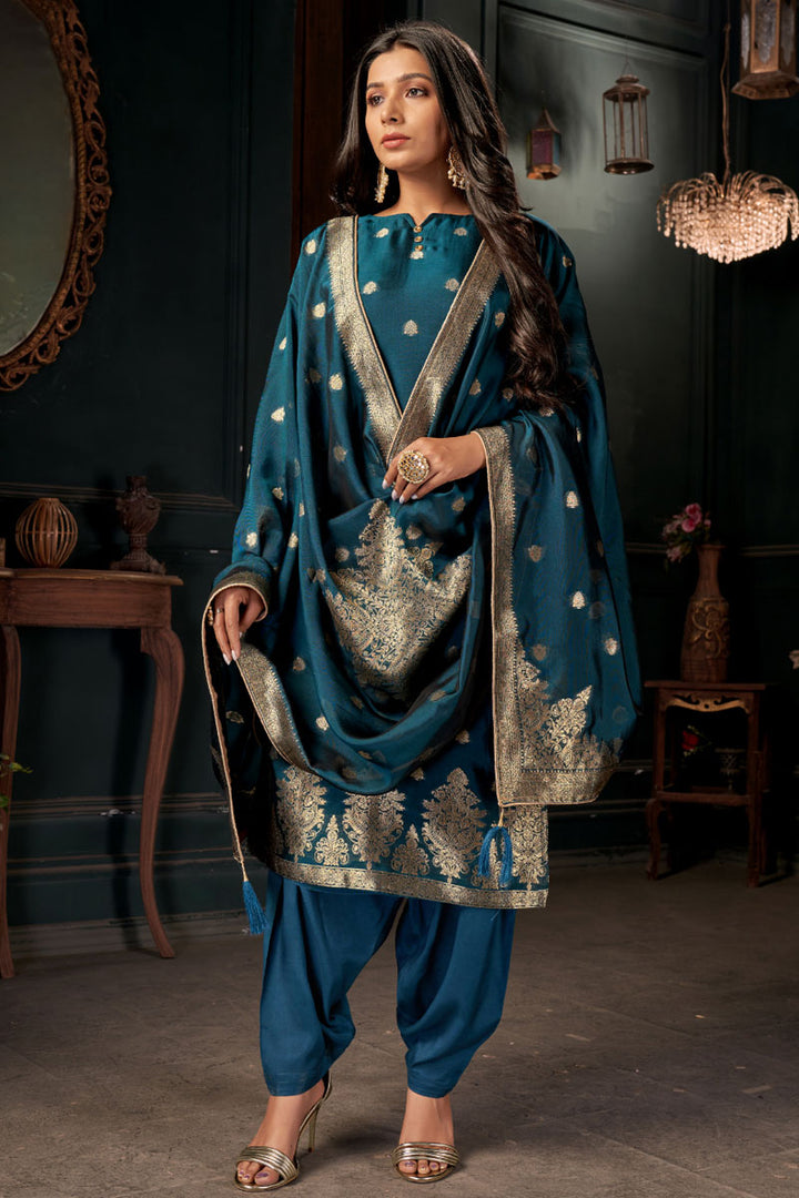 Dazzling Teal Color Weaving Designs Patiala Suit In Art Silk Fabric